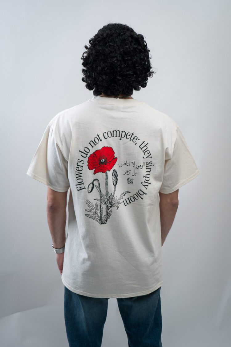 Flowers do not complete, they simply bloom Natural Tee